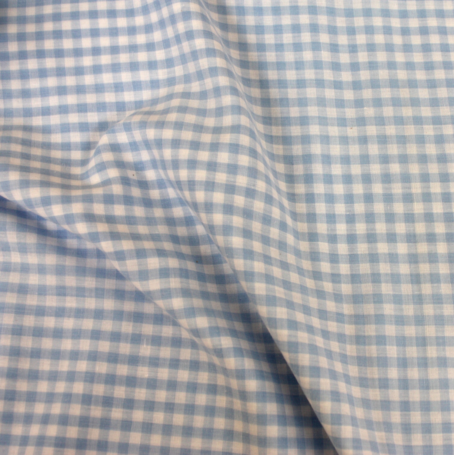 Light Blue Gingham Cloth Connection